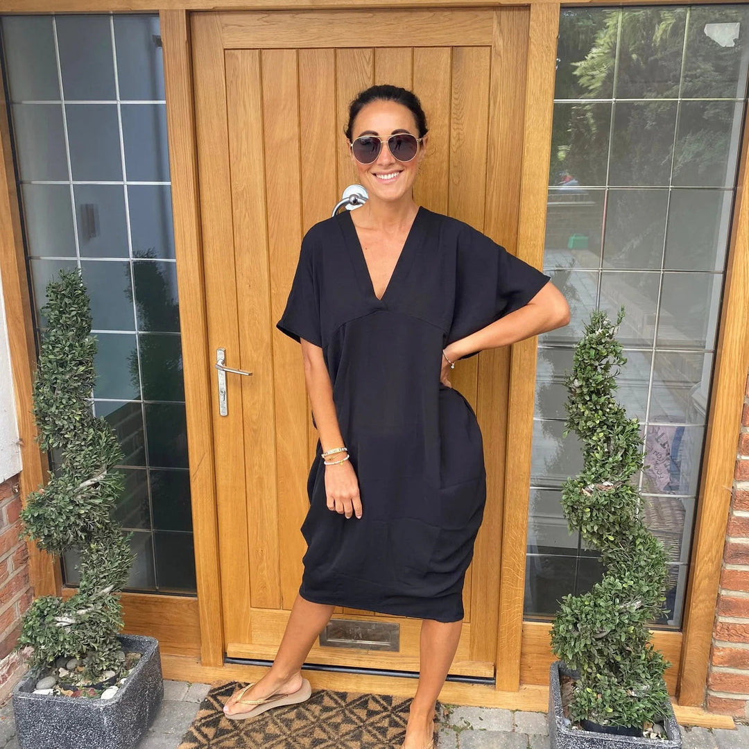Elegant Women's Dress with Loose Fit and V-Neck Chic Daily Comfort - Elena Harper