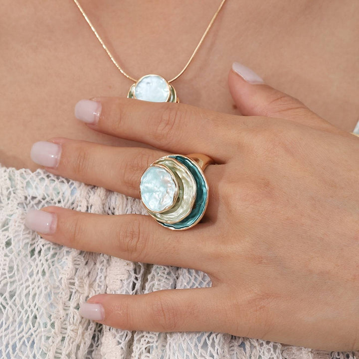 Emma & Rose Cape Town Shana™ boho triple layer ring featuring layered gold-tone bands and intricate detailing.