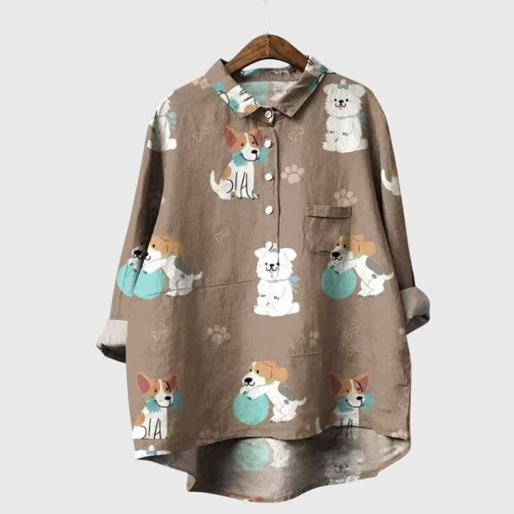 Elegant Emma & Rose Cape Town Elva™ blouse featuring a stylish design and soft fabric, displayed on a hanger.
