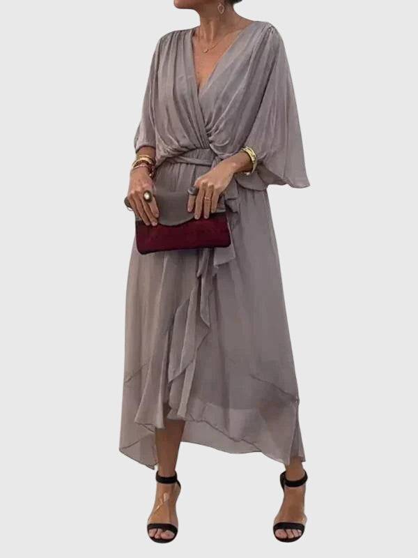 Bethany™ elegant dress by Emma & Rose Cape Town, featuring a stylish design with flowing fabric and intricate detailing.