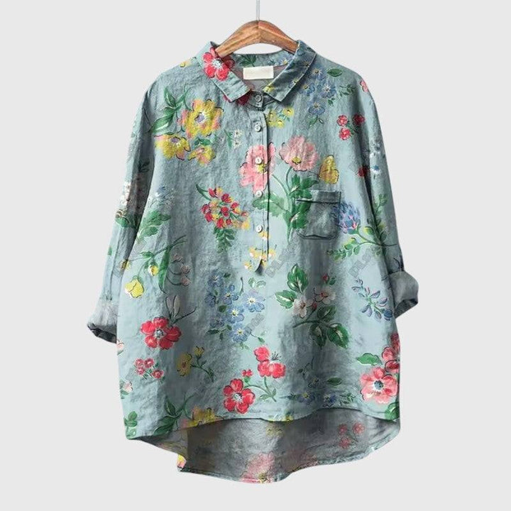 Elegant Linnea™ blouse by Emma & Rose Cape Town, featuring a stylish, flowy design with long sleeves and intricate detailing.