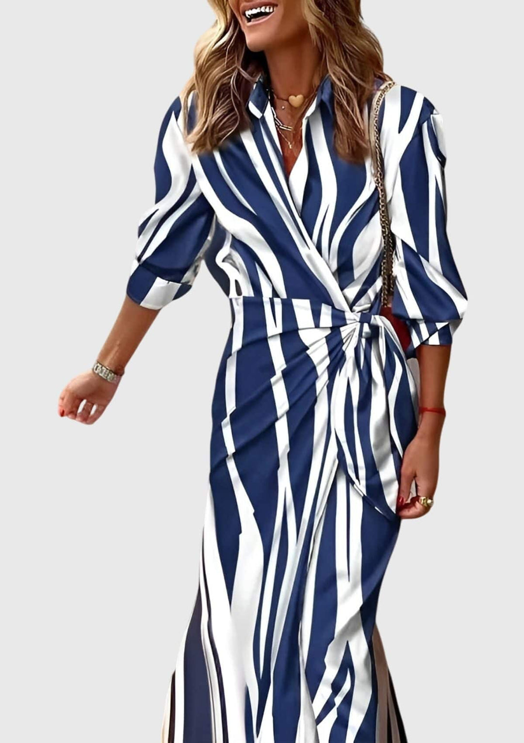 Everly™ Elegant Wrap Dress by Emma & Rose Cape Town featuring a stylish floral print and flowing fabric.