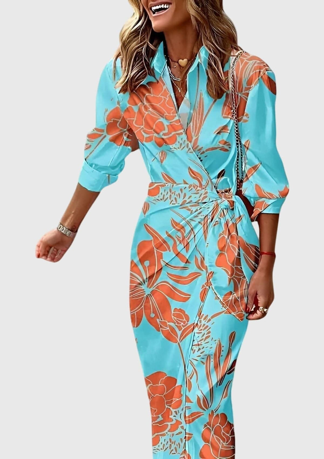 Everly™ elegant wrap dress with floral print by Emma & Rose Cape Town, shown in a stylish, flowing fabric design.