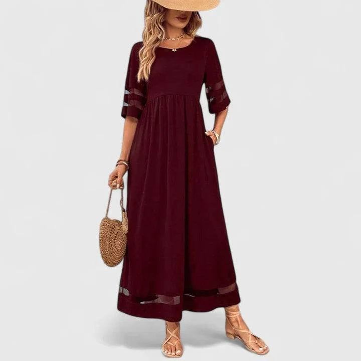 Elegant Delymarina™ midi dress by Emma & Rose Cape Town featuring a flowing fabric and stylish design in a close-up view.