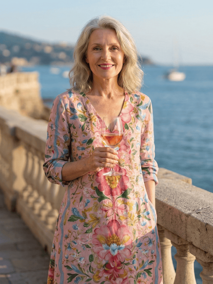 Emma & Rose Cape Town Julien™ Form Floral Midi Dress featuring a fitted silhouette and vibrant floral pattern.