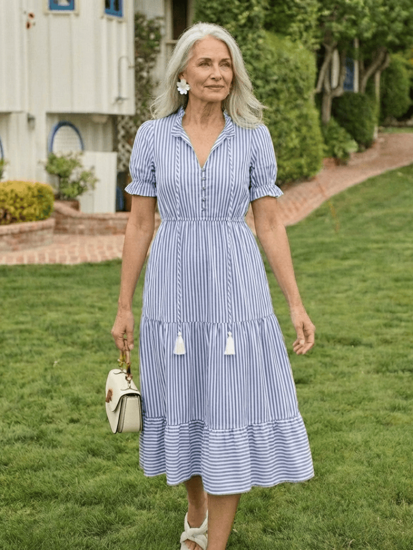 Emma & Rose Cape Town Dakota striped tiered midi dress with flowing fabric and tiered design, styled with a sleeveless silhouette.