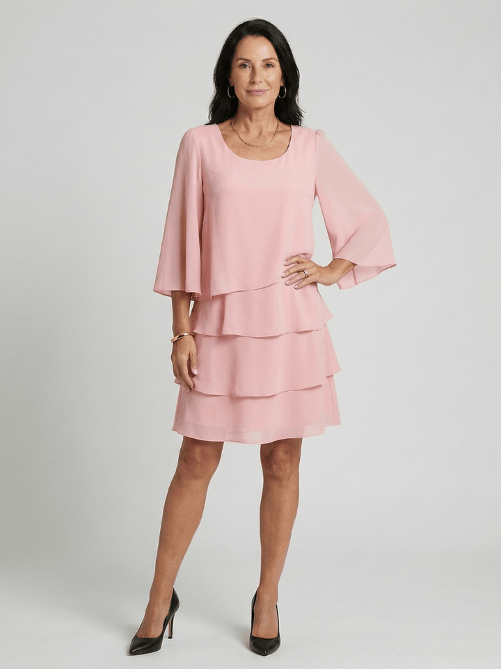 Della™ sleeve knee-length dress by Emma & Rose Cape Town, featuring a fitted silhouette and elegant design in a neutral fabric.