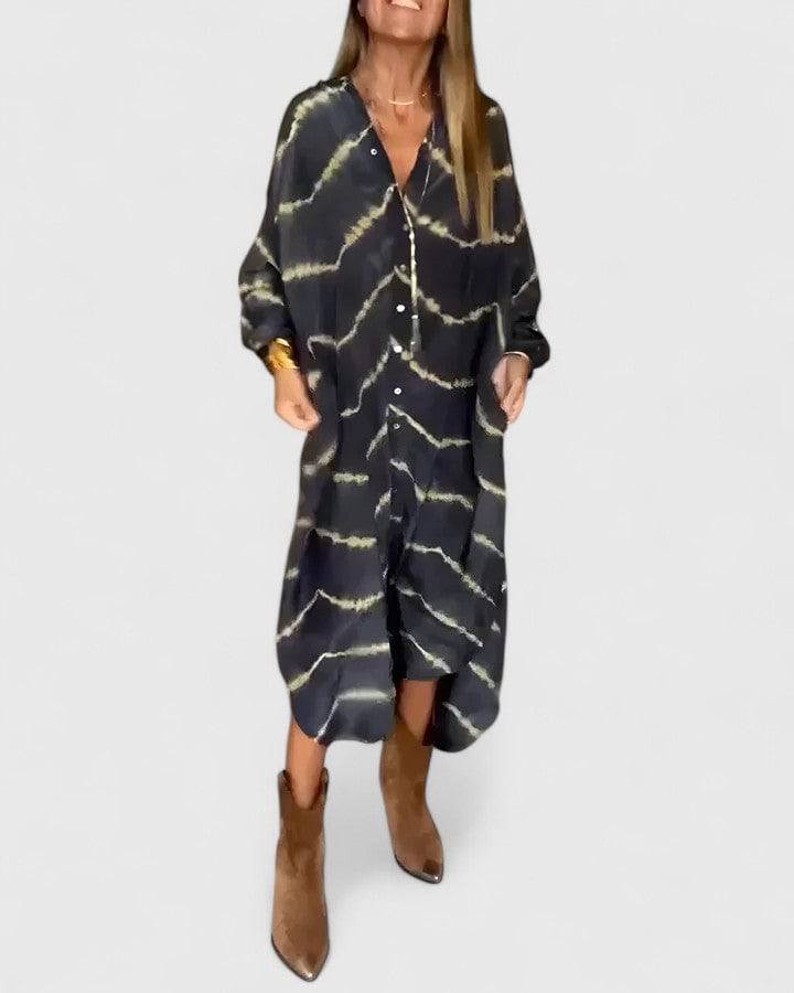 Emma & Rose Cape Town Amelie™ boho striped maxi dress featuring flowing fabric and a relaxed, trendy style.