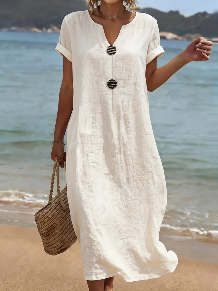 Long Women's Dress with Split Neckline and Decorative Buttons