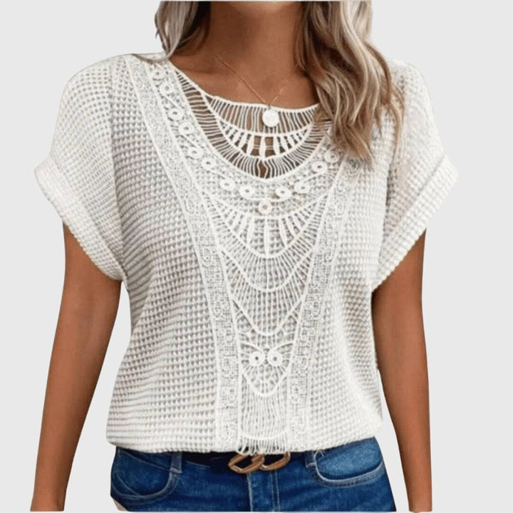 Elegant Ibiza blouse from Pearl™ by Emma & Rose Cape Town, featuring lightweight fabric and intricate embroidery.