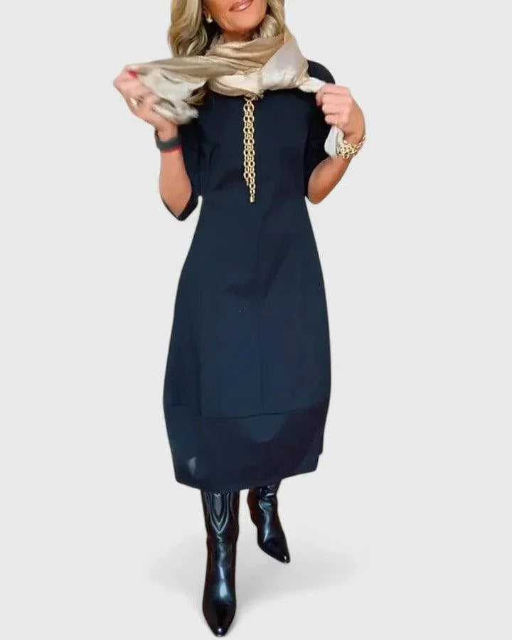 Elegant Danyshka™ midi dress by Emma & Rose Cape Town, featuring a flowing silhouette and stylish design in soft fabric.