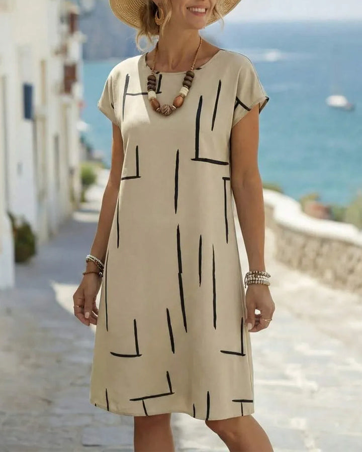 Soline™ | Tummy Concealing Dress with Line Print