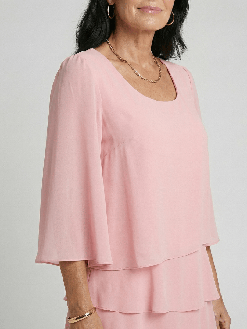 Della™ knee-length sleeve dress by Emma & Rose Cape Town, in a stylish, elegant design with a fitted silhouette and classic neckline.