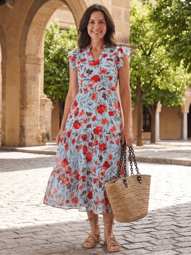 Lila™ V-neck tiered midi dress by Emma & Rose Cape Town, featuring flowing fabric and a stylish V-neck design.