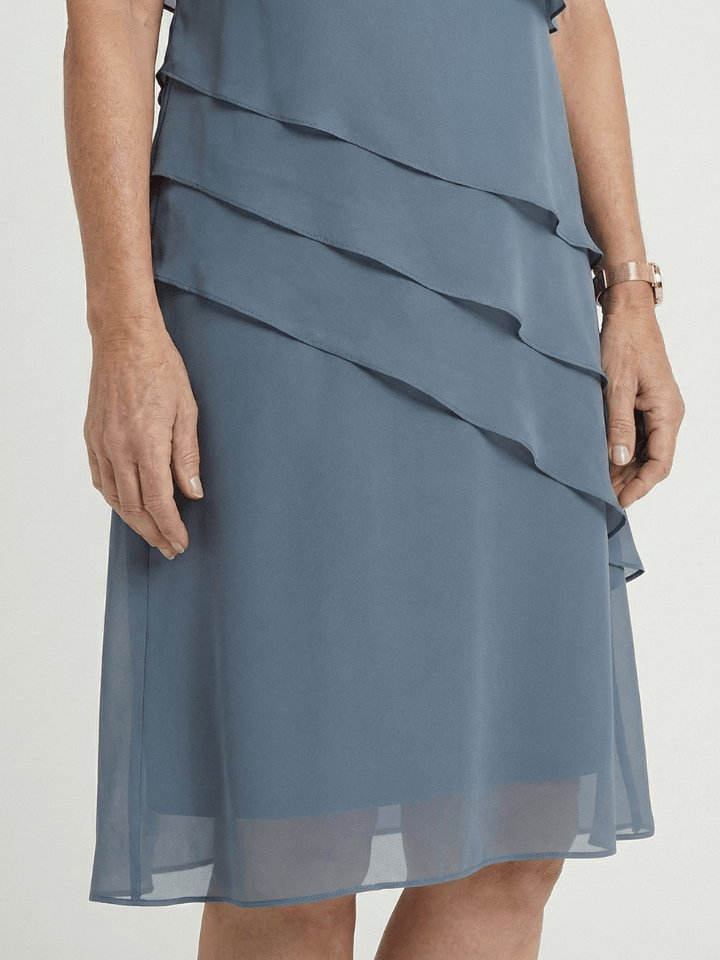 Orson™ contour knee-length dress by Emma & Rose Cape Town, featuring a fitted silhouette and elegant design.