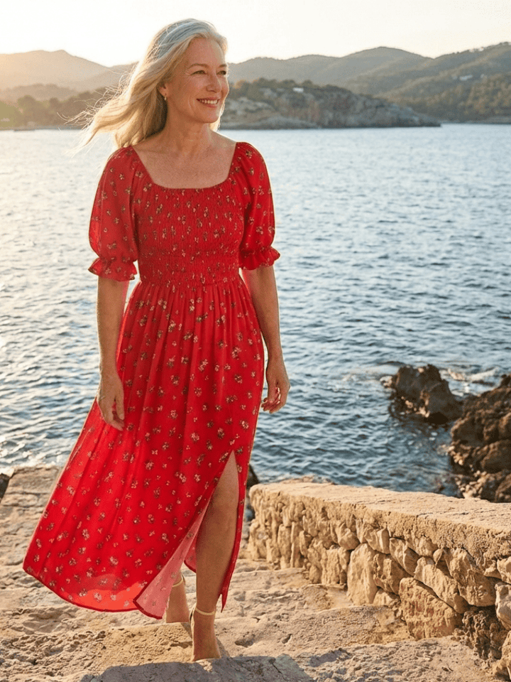Delphine™ Puff Sleeve Midi Dress by Emma & Rose Cape Town, featuring a fitted bodice, puff sleeves, and flowing midi skirt.