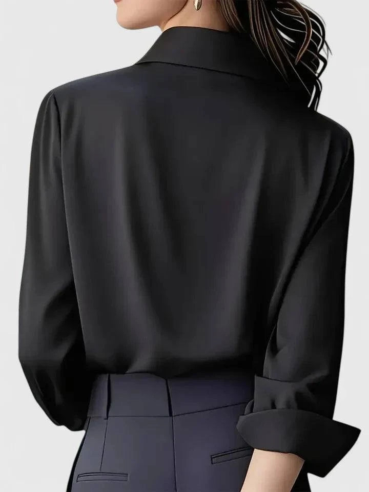 Elegant Melvaya™ top by Emma & Rose Cape Town, showcasing a stylish, fitted design with detailed fabric texture.