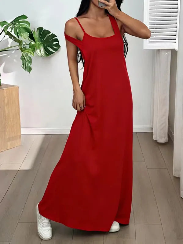 Long women's dress with a two-piece effect and side cutouts