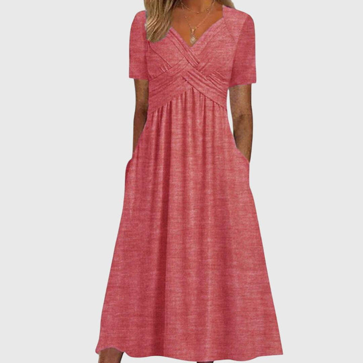Amanda™ flattering dress by Emma & Rose Cape Town, featuring a stylish fit and elegant design, shown in a vibrant fabric.
