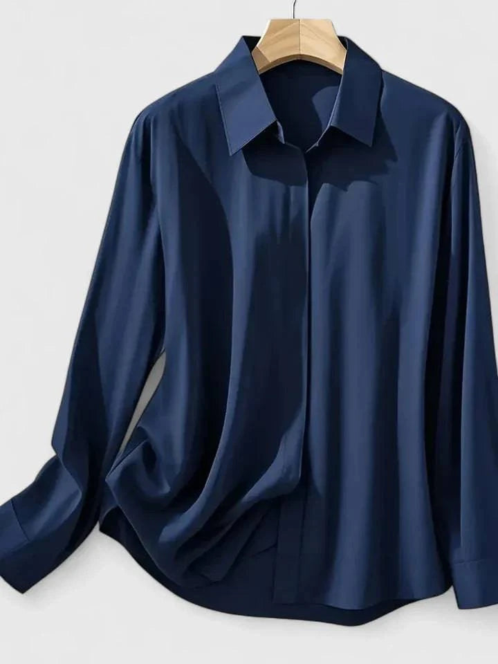 Elegant Melvaya™ top by Emma & Rose Cape Town, featuring a stylish, fitted design with intricate fabric details.