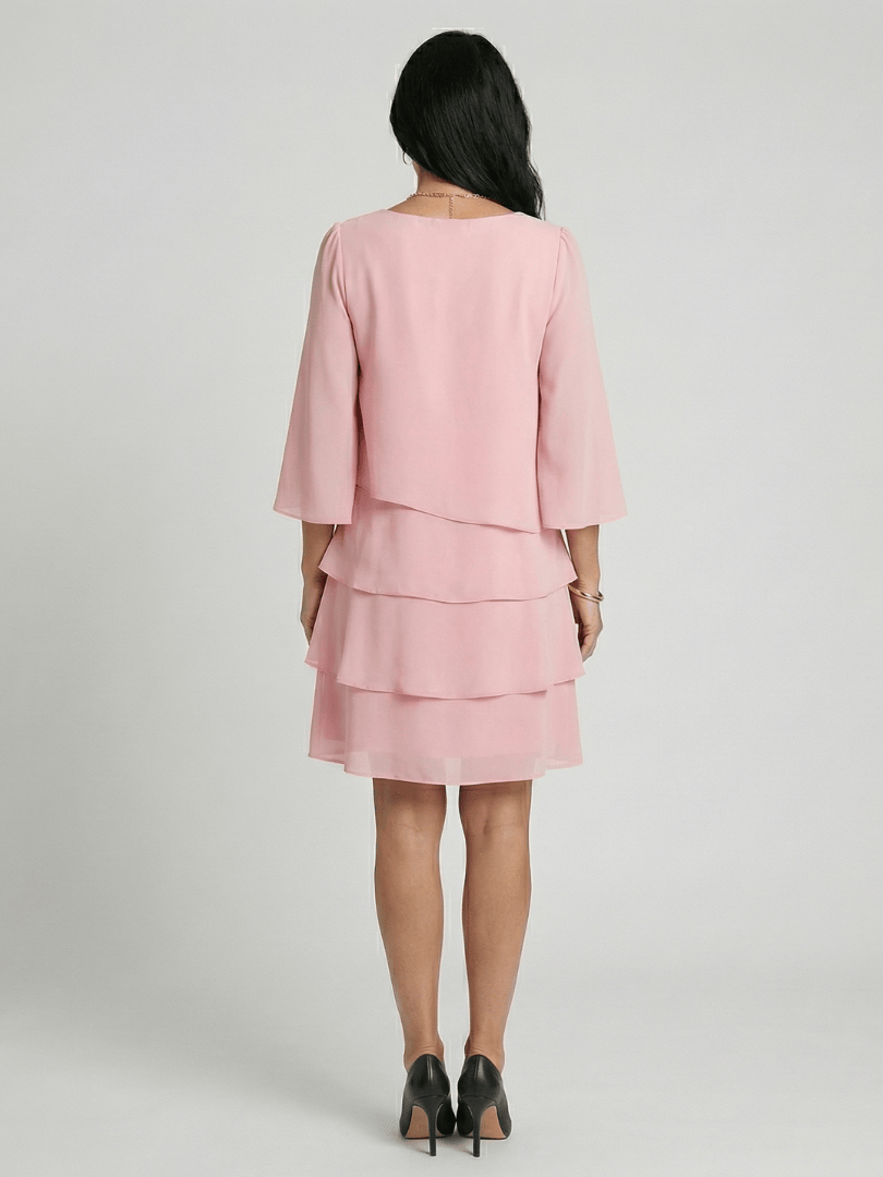 Della™ sleeve knee-length dress by Emma & Rose Cape Town, featuring a fitted silhouette and elegant design in soft fabric.