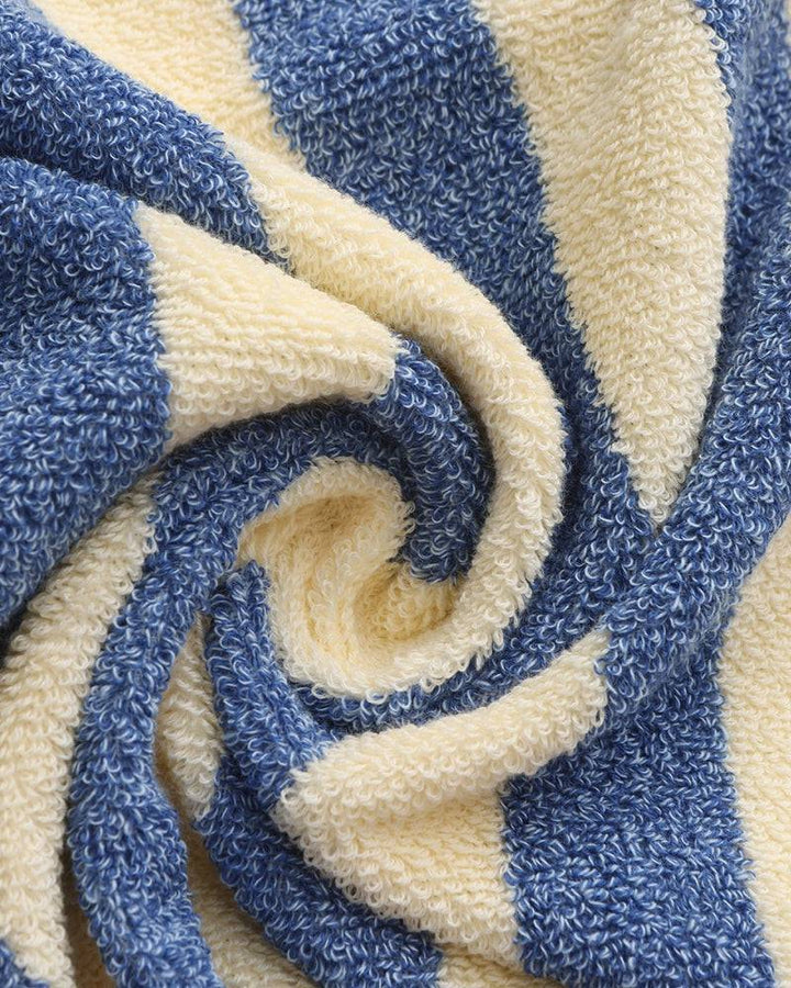 Emma & Rose Manhattan Lance™ Sea Stripe Hand Towel with blue and white nautical pattern, soft cotton fabric.