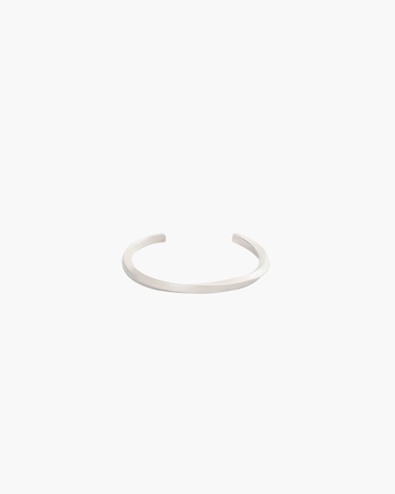 Emma & Rose Manhattan Yana™ Sleek Statement Cuff jewelry with smooth metallic finish and modern design on a white background.