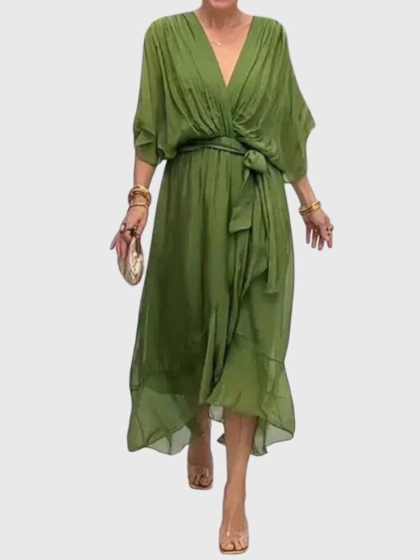 Bethany™ elegant dress by Emma & Rose Cape Town, featuring a stylish, flowing design with intricate details.