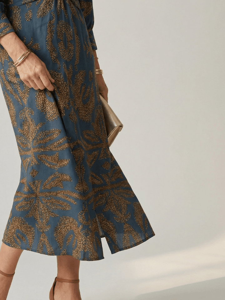 Lune™ Natural Wrap Midi Dress by Emma & Rose Cape Town, featuring flowing fabric and elegant wrap design.