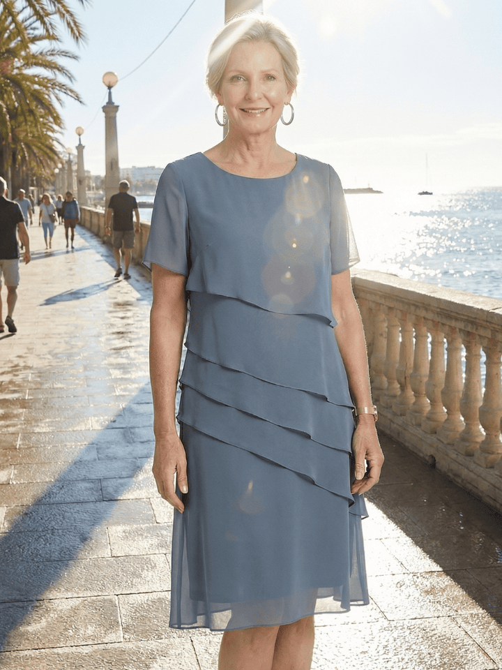 Orson™ Contour Knee Length Dress by Emma & Rose Cape Town, featuring a fitted silhouette and elegant design.