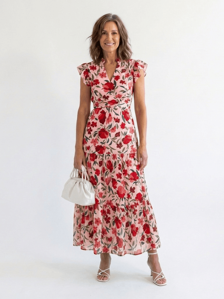 Lila™ V-neck tiered midi dress by Emma & Rose Cape Town, featuring flowing fabric and a stylish V-neck design.