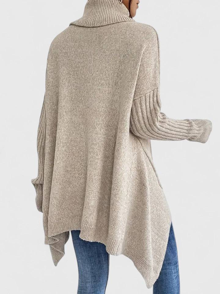 Keiralyss™ comfortable sweater by Emma & Rose Cape Town, featuring a cozy knit design in soft, neutral tones.