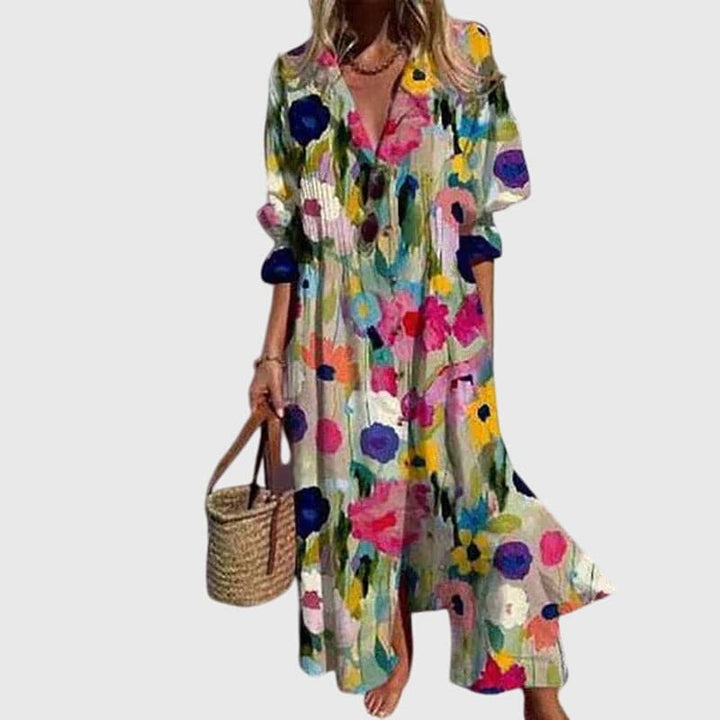 Zariah™ elegant bohemian dress by Emma & Rose Cape Town, featuring flowing fabric and intricate patterns, displayed on a model.