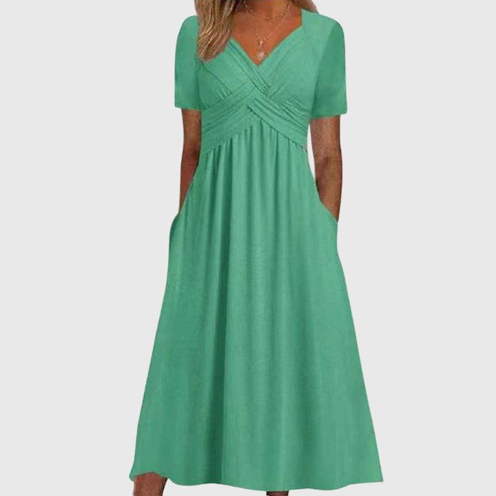Amanda™ flattering dress by Emma & Rose Cape Town, showcasing a stylish, fitted design with elegant fabric and a modern silhouette.