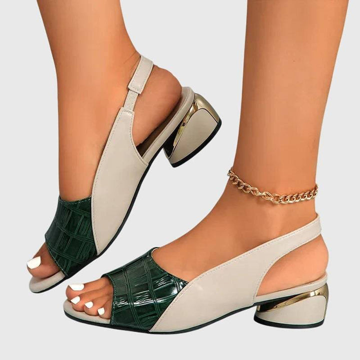 Emma & Rose Cape Town Whitney™ sandals with soft luxurious fabrics, featuring stylish straps and comfortable flat soles.