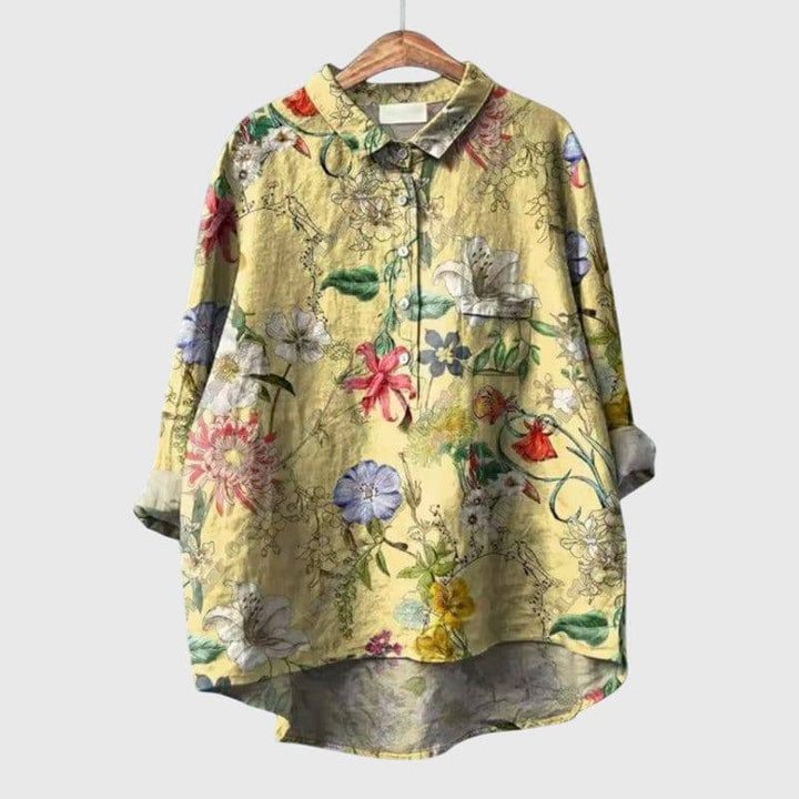 Elegant Linnea™ blouse by Emma & Rose Cape Town, featuring a stylish design and lightweight fabric, shown on a hanger.