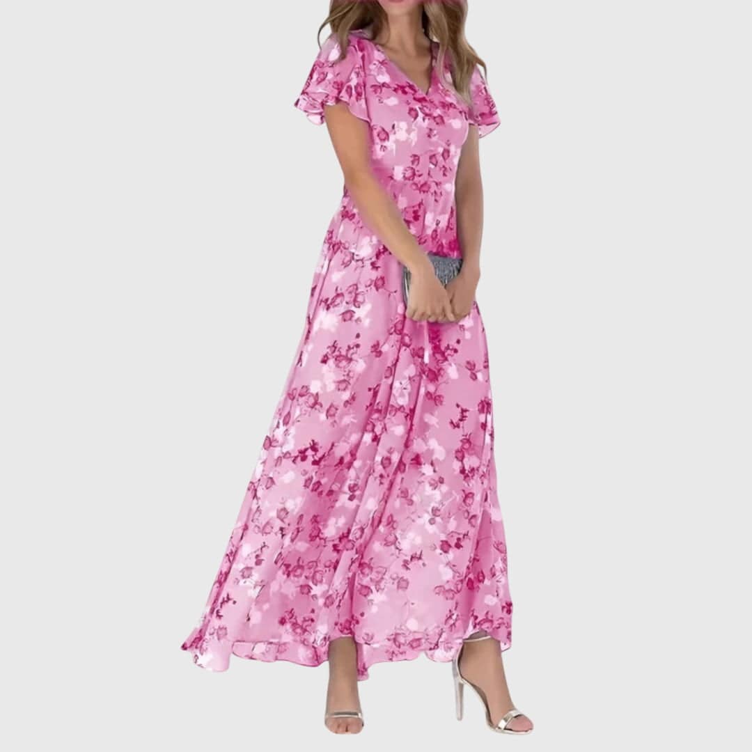 Lola™ figure-flattering spring dress from Emma & Rose Cape Town's clearance collection, showcasing a stylish, fitted design and vibrant fabric.