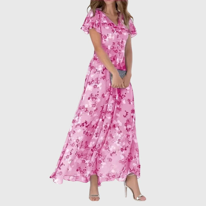 Lola™ figure-flattering spring dress from Emma & Rose Cape Town's clearance collection, showcasing a stylish, fitted design and vibrant fabric.