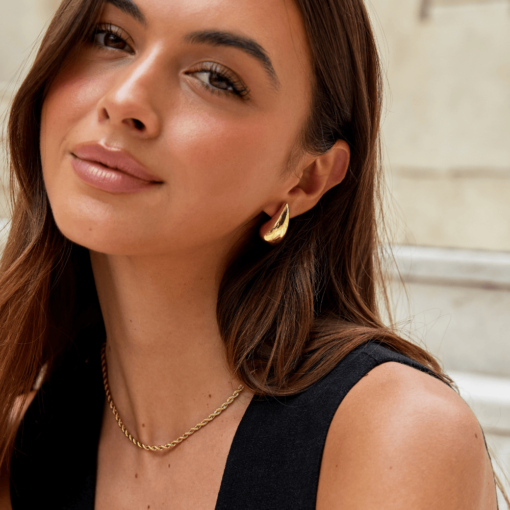 Emma & Rose Cape Town Luna™ Stiliga Gold Earrings featuring elegant teardrop design in polished gold finish
