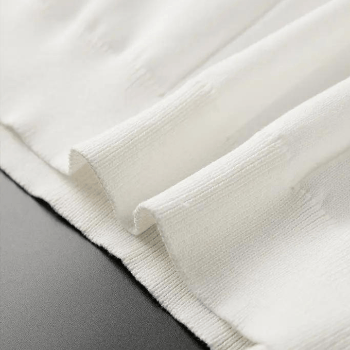 Emma & Rose Manhattan Portofino™ soft polo shirt in a stylish design, shown in a close-up view.
