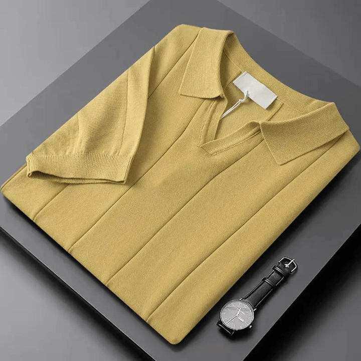 Emma & Rose Manhattan Portofino™ soft polo shirt in a pastel color, showing a close-up of the fabric and collar detail.