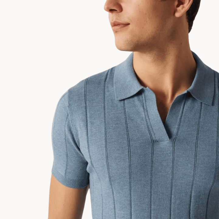 Emma & Rose Manhattan Portofino™ Soft Polo in light fabric, featuring a classic collar and short sleeves, displayed on a flat lay.