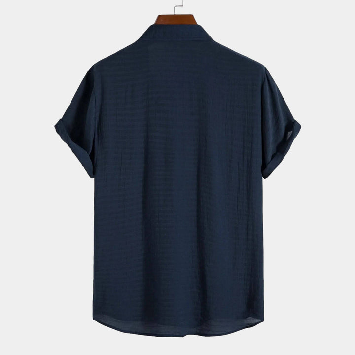 Emma & Rose Manhattan Rio™ summer shirt, lightweight casual shirt with short sleeves and a relaxed fit, displayed on a hanger.