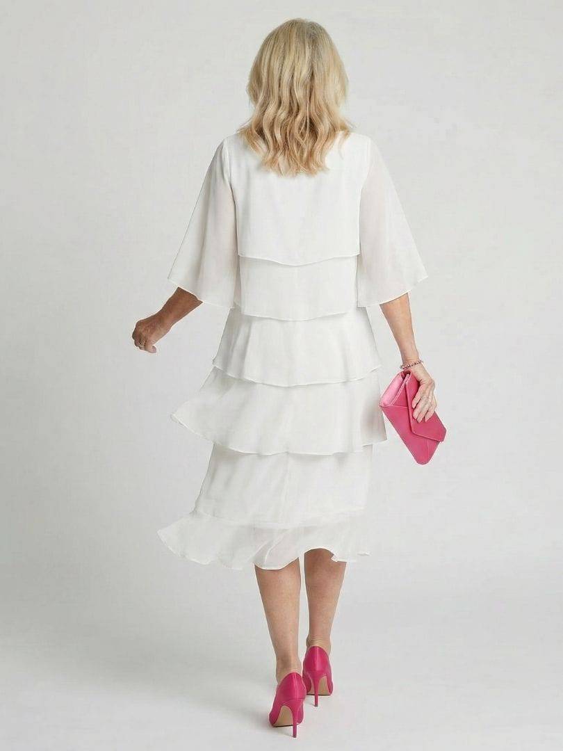 Emma & Rose Cape Town Brent layered tier midi dress showing a flowy, tiered fabric design in soft, elegant style.