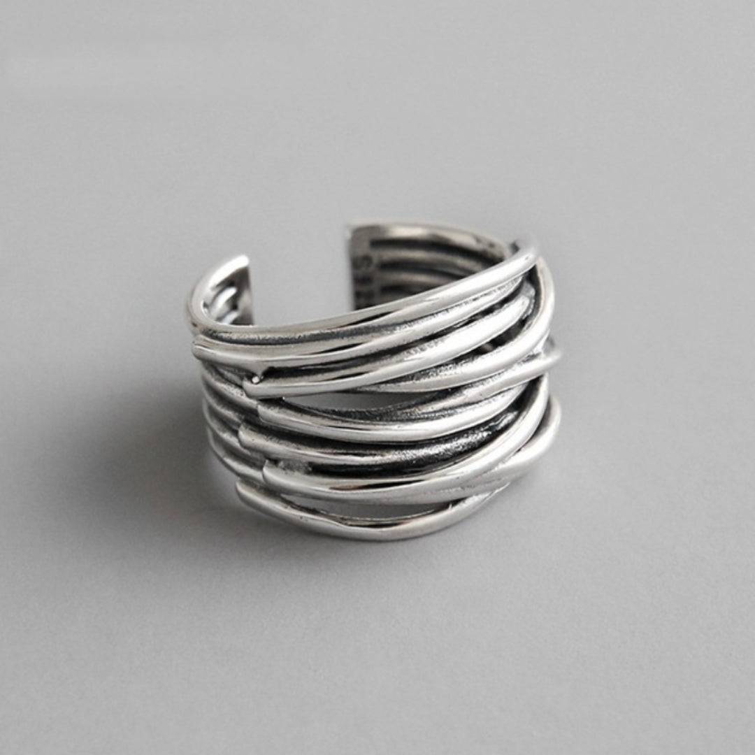 Elegant silver ring from Taylor™ by Emma & Rose Cape Town featuring a sleek, polished design with intricate detailing.