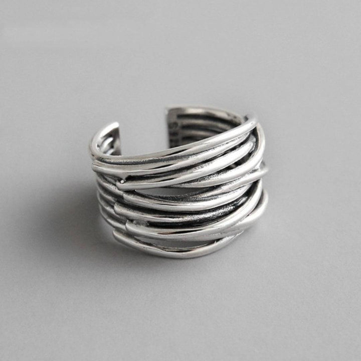 Elegant silver ring from Taylor™ by Emma & Rose Cape Town featuring a sleek, polished design with intricate detailing.