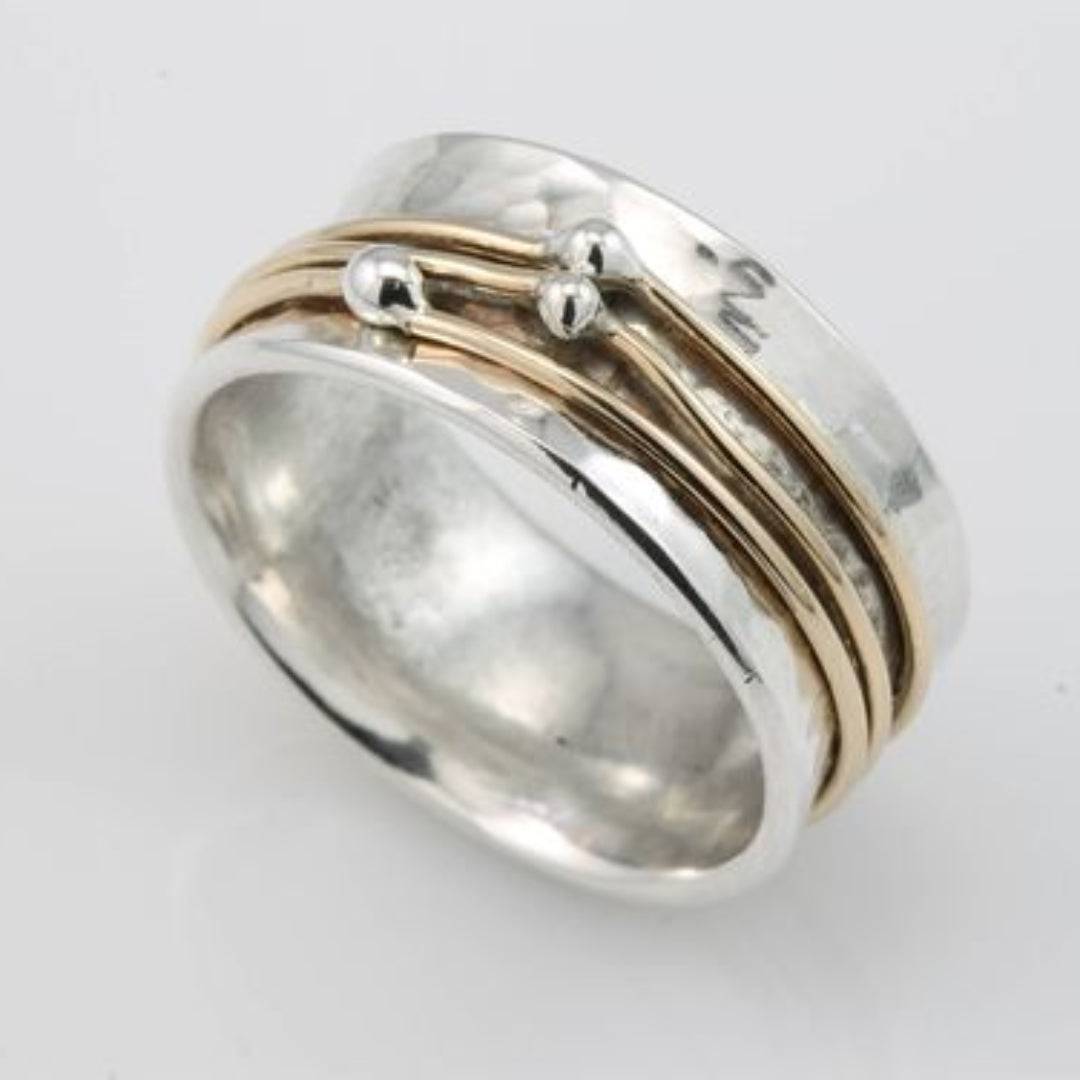 Gold-plated silver ring named Stella™ with a sleek, timeless design, featuring a polished finish and elegant band.