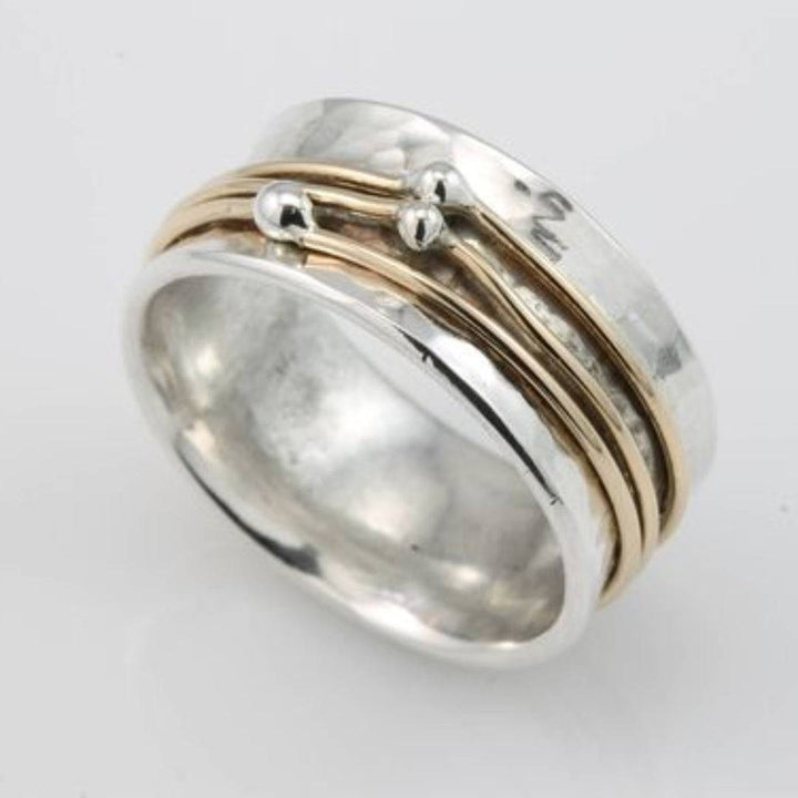 Gold-plated silver ring named Stella™ with a sleek, timeless design, featuring a polished finish and elegant band.