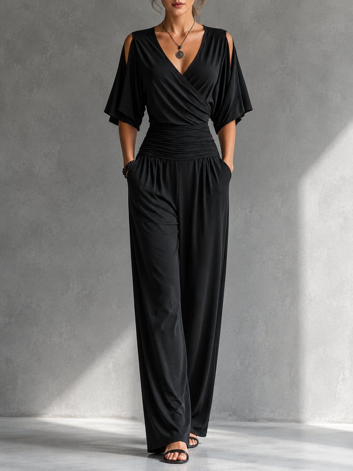 Elegant women's jumpsuit with a crossover V-neck and wide pants