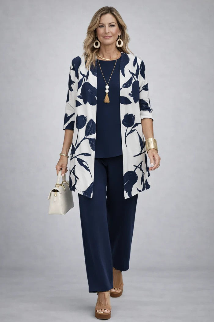 Emma & Rose Cape Town Sandra 3-piece set featuring stylish clothing with intricate designs on fabric, displayed on a hanger.